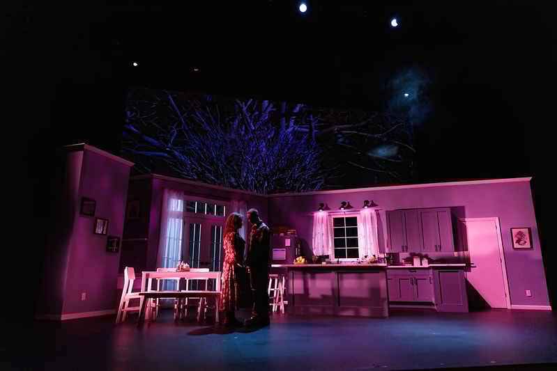 Three ballet dancers off stage