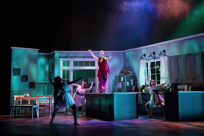 Three ballet dancers off stage