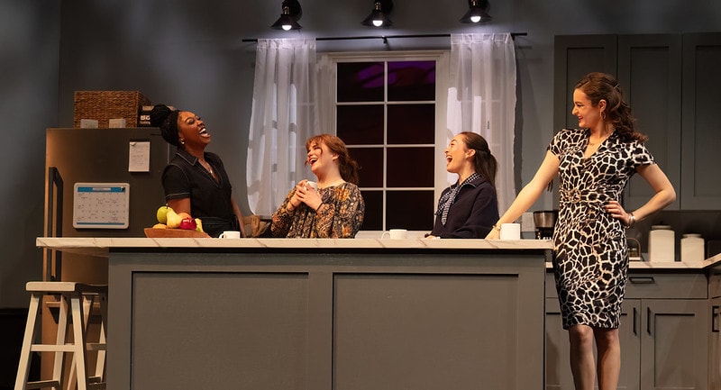 Three ballet dancers off stage